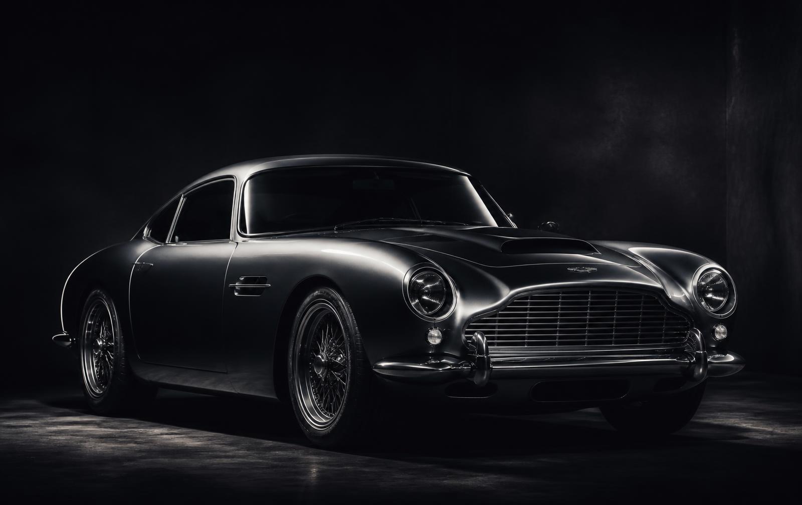 Classic sports car photographed in a dark studio